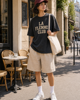 France La Flemme Club graphic set sunny model scene with faded black tee burgundy cap natural canvas tote and washed shorts