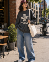 In Money We Trust sweatshirt full outfit with wide leg jeans cap and natural canvas tote