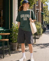 Ireland Grand So graphic set sunny model scene with green tee cap natural canvas tote and washed shorts