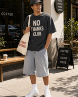 USA No Thanks Club graphic set sunny model scene with tee cap natural canvas tote and washed shorts